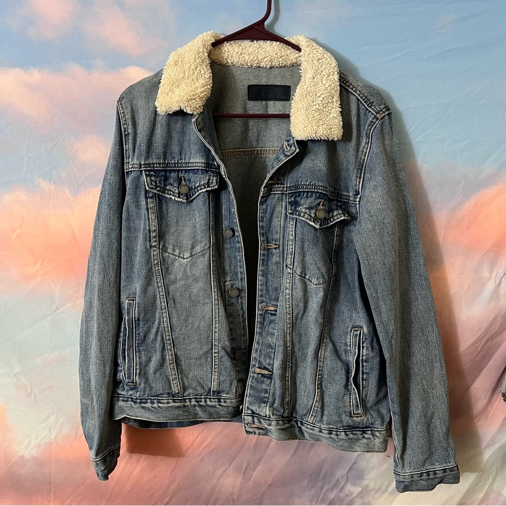 Denim jacket with white collar